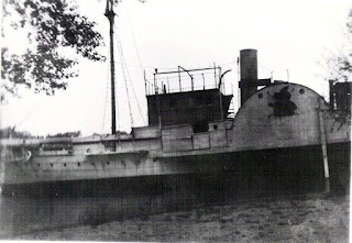 USS Wolverine pushed onto the banks of Misery Bay (1927)