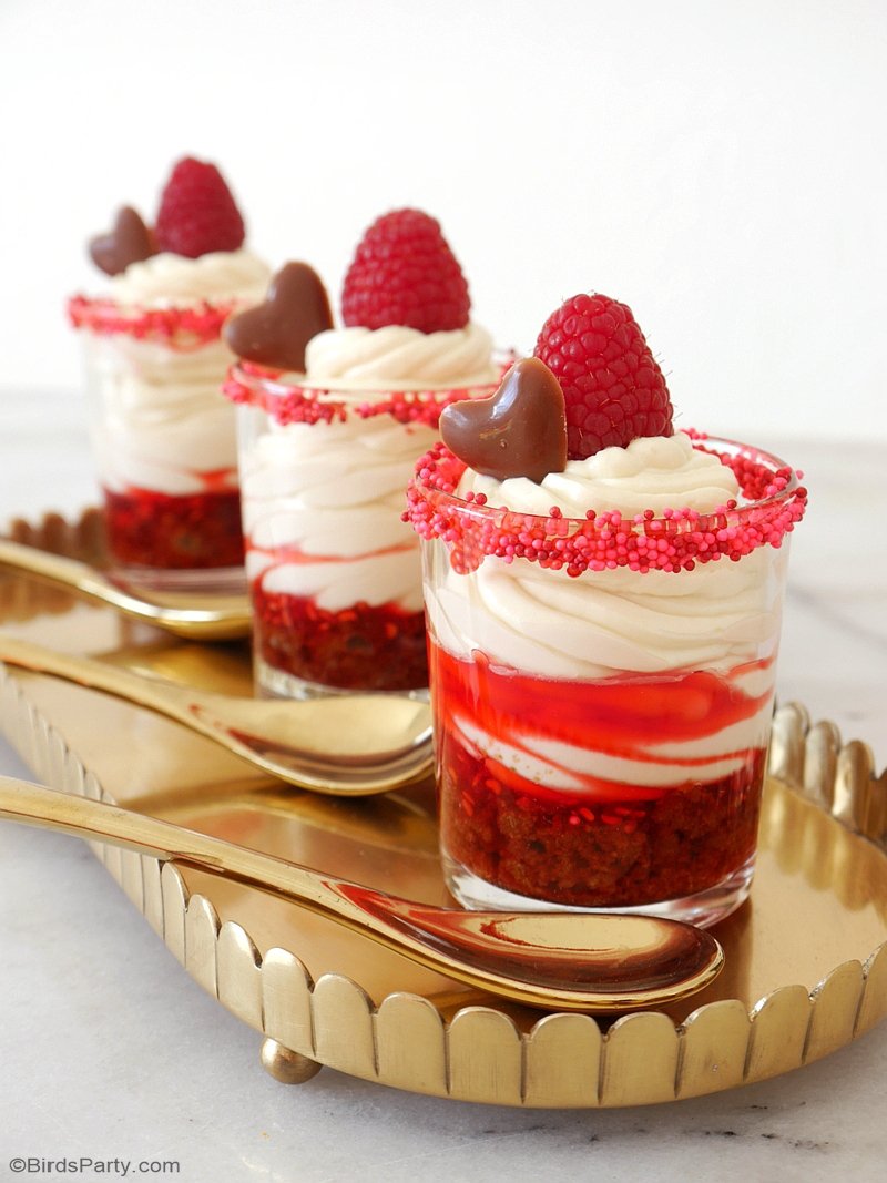 No-Bake Raspberry Cheesecake Parfaits Recipe - quick, delicious and easy desserts to make for your Valentine's Galentine's Day party! by BirdsParty.com @birdsparty #recipe #recipes #nobakerecipe #nobake #parfaits #valentinesdaydessert #dessert #easydessert