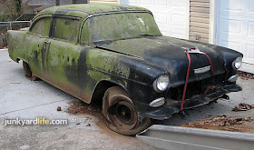 1955 Chevy looks dirty, moldy, and beautiful as she hits the ground.