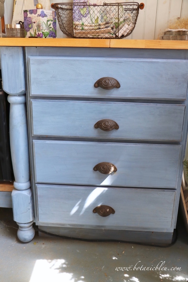 garden-shed-blue-painted-unfinished-stock-drawers