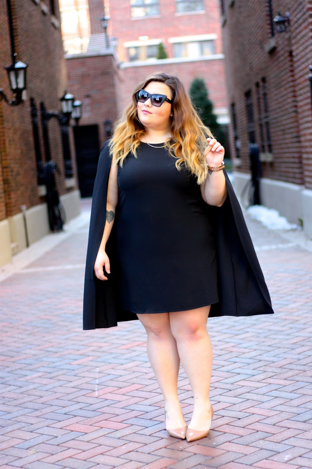 little black dress plus size, LBD, OOTD, natalie craig, cape dress, chicago, natalie in the city, plus size fashion, fashion blogger, forever 21 plus, capes, 2016 fashion trends, why men dont like certain trends, curves and confidence, quay sunglasses blogger, bold sunglasses for my face shape