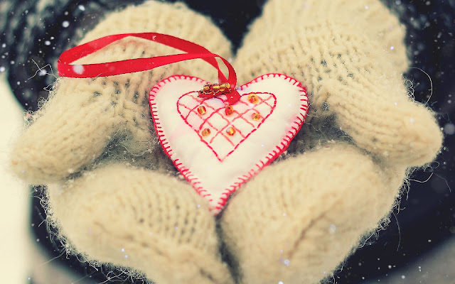 Liefdes hartje en wanten in de winter