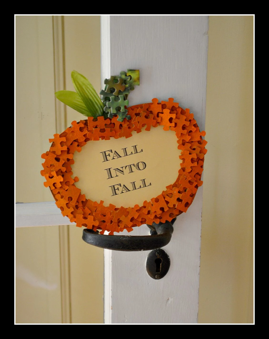 Puzzle piece pumpkin frame with Fall into fall words