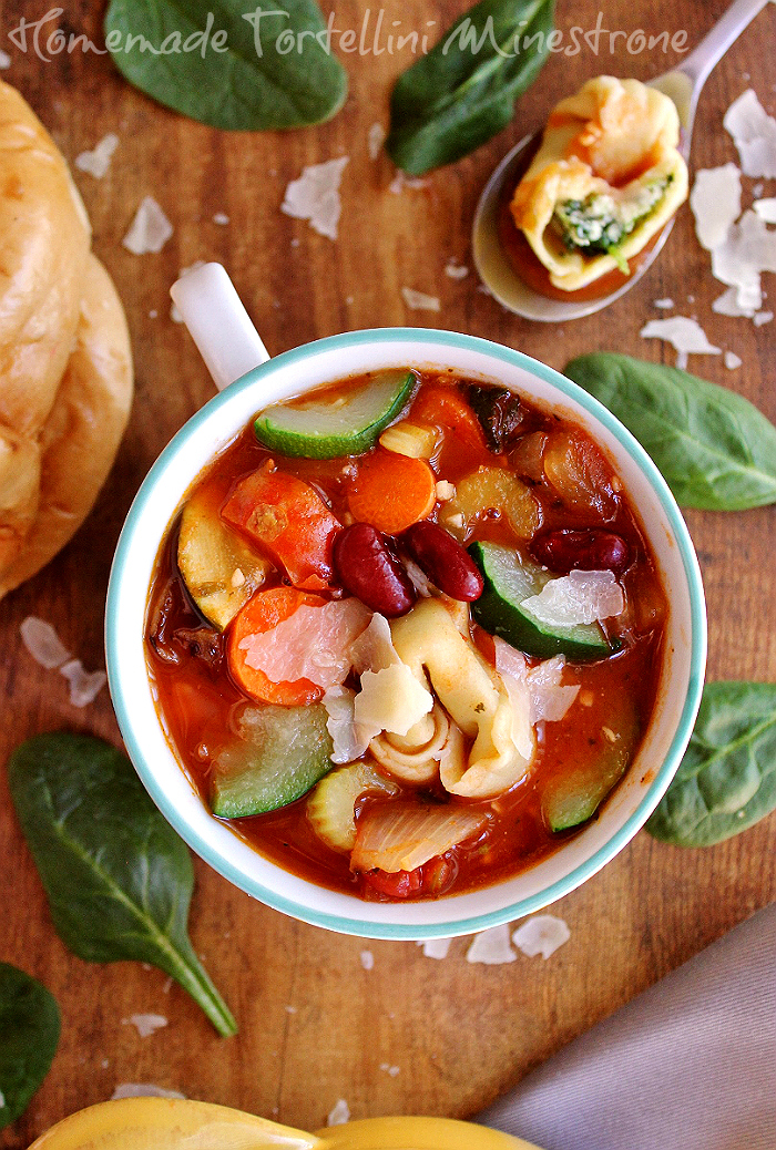 This hearty homemade Tortellini Minestrone features handmade spinach ricotta tortellini and a feast of fresh harvest vegetables sure to comfort in any season.