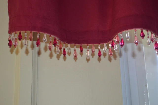 Adding beads to curtains