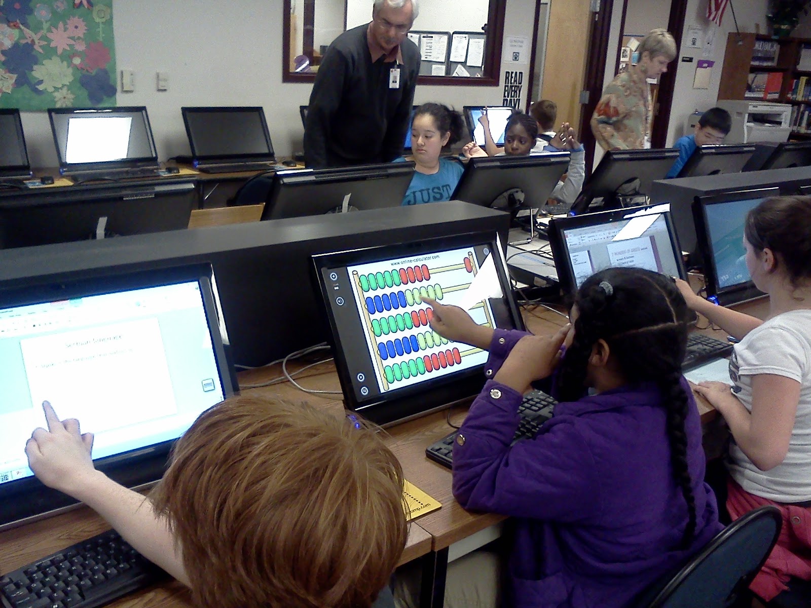 Principal Taylor's "Small" blog New Touch Screen Computers in Library