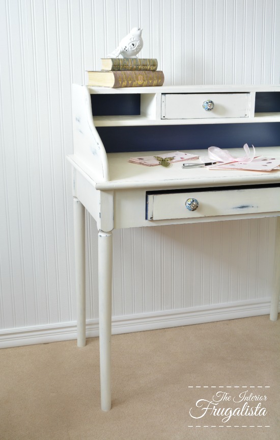 Desk makeover painted white and distressed to reveal graphite underneath