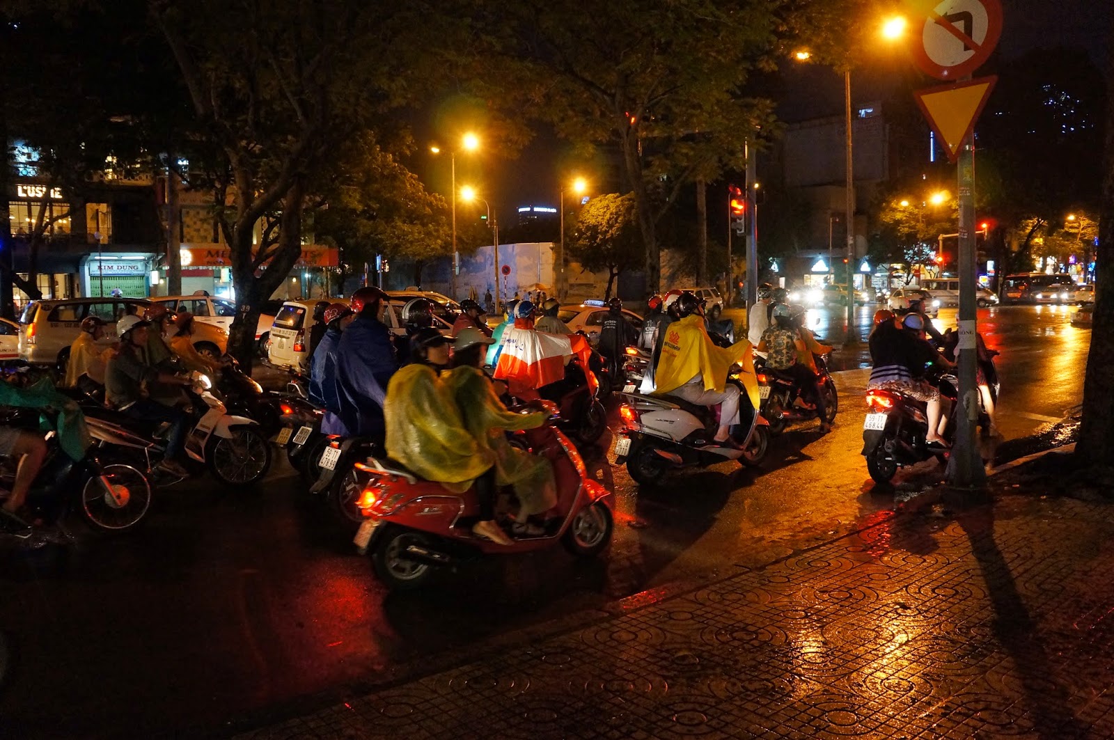 Motorcyclists riding in the rain