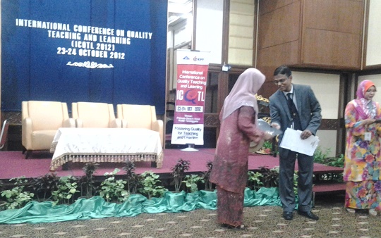Distributing Awards at ICQTL-2012, Malaysia