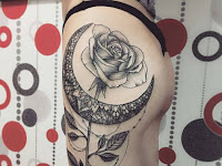 Floral Moon Phases Spine Tattoo