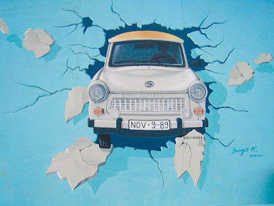 Car bursting through the wall by Birgit Kinder-East Side Gallery, Berlin, Germany