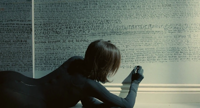 The Skin I Live In 2011 film Pedro Almoldovar screenshot elena anaya vera drawing wall pencil
