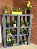 Pallets de madera reutilizados para colocar plantas Pallets de madera reutilizados para colocar plantas