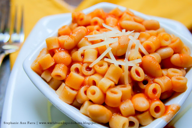 Pasta con Fagioli | -1 Box Ditalini Pasta - Olive Oil (enough to coat the bottom of the pan) - 3 1/2 cups/28 ounces of Tomato Sauce of choice* - 1 15.5 ounce can of Navy Beans or Northern Beans  - 1 Small Onion - Salt and Pepper to taste - Grated Parmesan