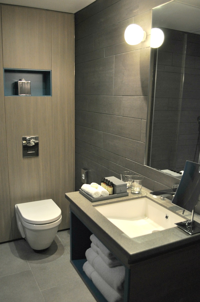 Grey modern stylish bathroom interior with rain shower