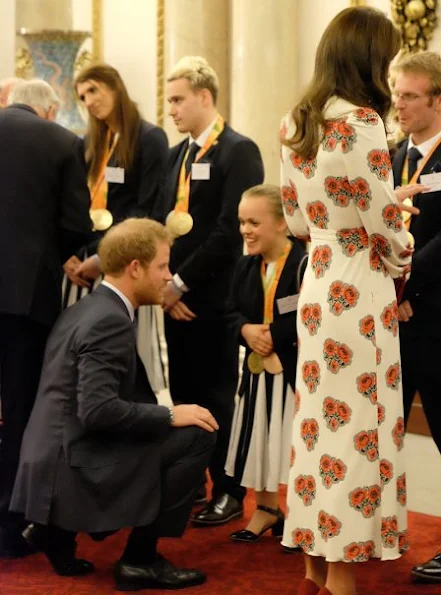 Queen Elizabeth, Prince William, Catherine, Duchess of Cambridge, Prince Harry, Princess Anne and Prince Edward. Kate Middleton wore Alexander McQueen Silk Floral Midi Dress 