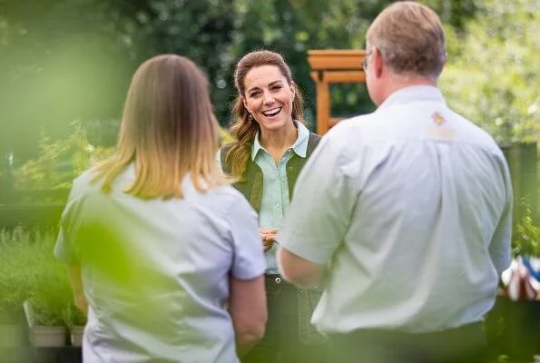 Kate Middleton wore Fjallraven Sormland vest, Jaeger linen shirt, Massimo Dutti satin trousers, Superga sneaker, Monica Vinader earrings