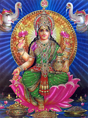Photo of Goddess Laksmi with golden pot in hand