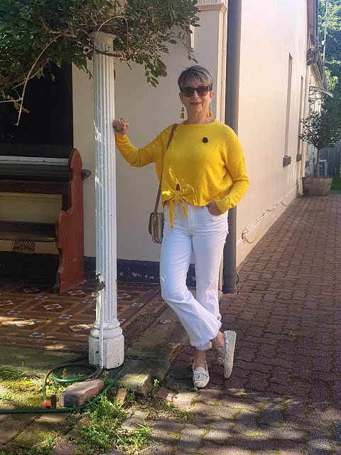 White cropped jeans, yellow jumper