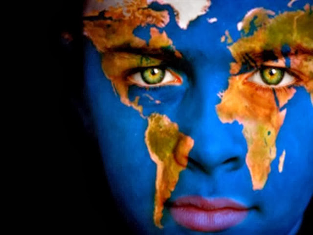 a blue woman face with pink lips and the continent imprinted on her face