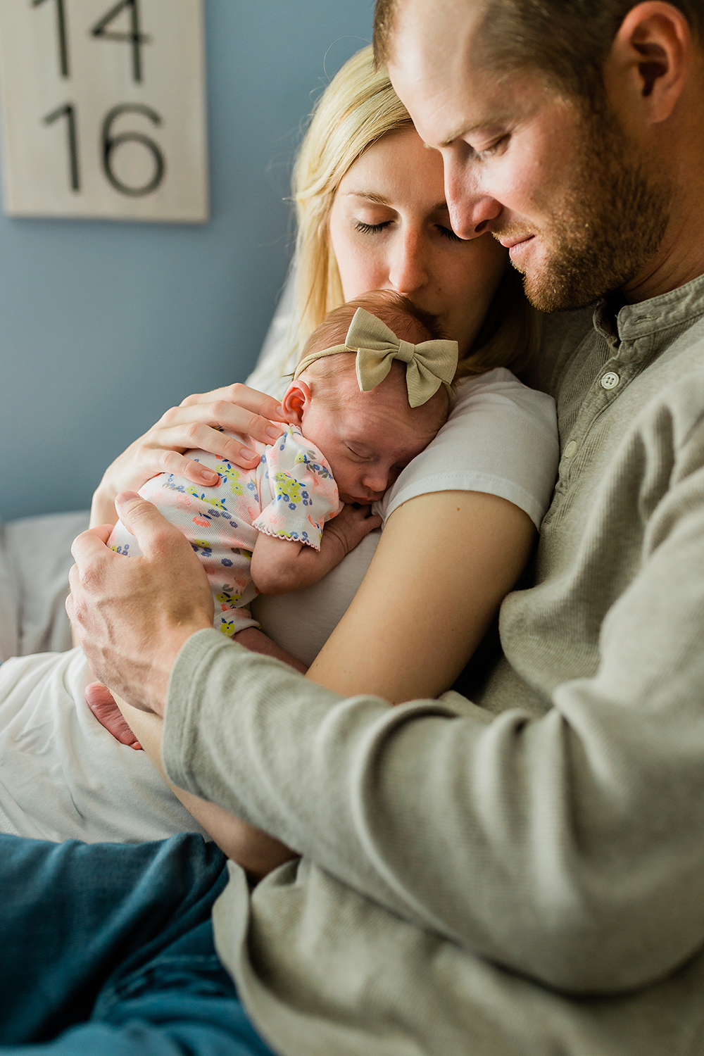 Family of three with a newborn baby girl, Idaho Lifestyle Newborn Family Photographer