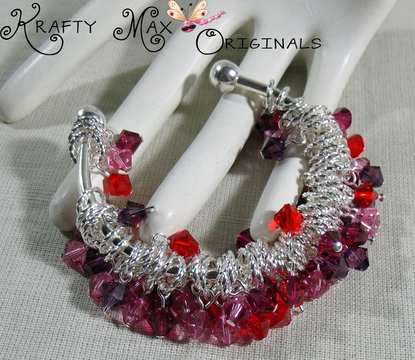 http://www.lajuliet.com/index.php/2013-01-04-15-21-51/ad/bangle,48/exclusive-shades-of-red-s-and-purples-s-handmade-bangle-bracelet-a-krafty-max-original-design,313