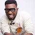 Timi Dakolo shares photo of his wife posing in his shoes as he reveals he misses her