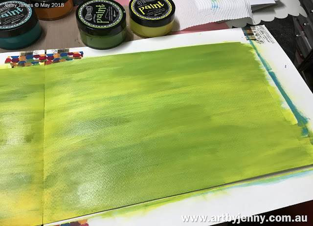 Dylusions paint in yellow and green are the start of this art journal page