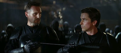 Liam Neeson and Christian Bale as Henri Ducard and Bruce Wayne in Batman Begins Liam Neeson and Christian Bale as Henri Ducard and Bruce Wayne in Batman Begins