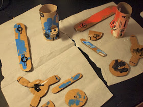 Toilet roll airplane pieces painted and drying