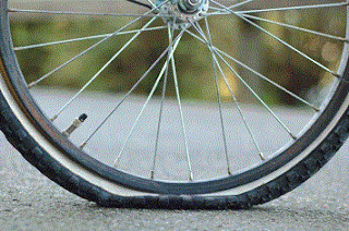 Bicycle with a Flat Tire