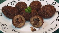 http://homemade-recipes.blogspot.com/2013/11/how-to-make-kibbeh-bi-shamiyeh.html