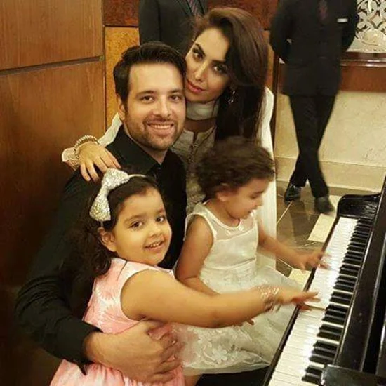 Mikaal Zulfiqar with his wife and daughters