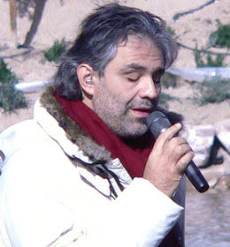 Andrea Bocelli performing a concert outdoors in the  United States, where he has a big following