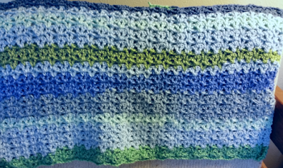 shawl with narrow stripes of greens and blues, mostly blue