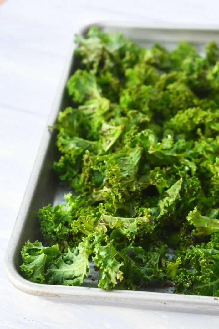 a baking sheet full of kale