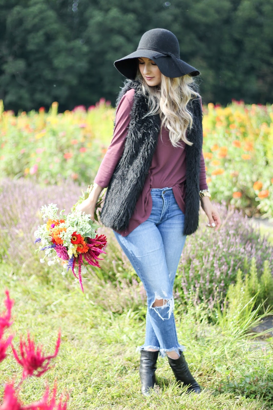 HOW TO STYLE A BLACK FUR VEST A Classy Fashionista