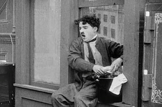 Кадр из фильма Чарли Чаплина The New Janitor (1914) - 3