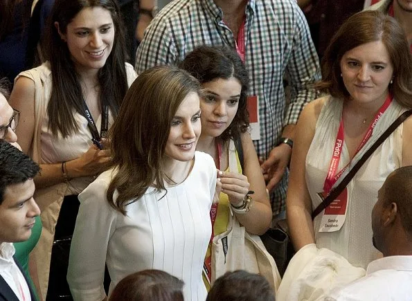 Queen Letizia wore Hugo Boss blouse and Magrit Pumps. Queen Letizia jewels, diamond earrings, Cartier diamond bracelet