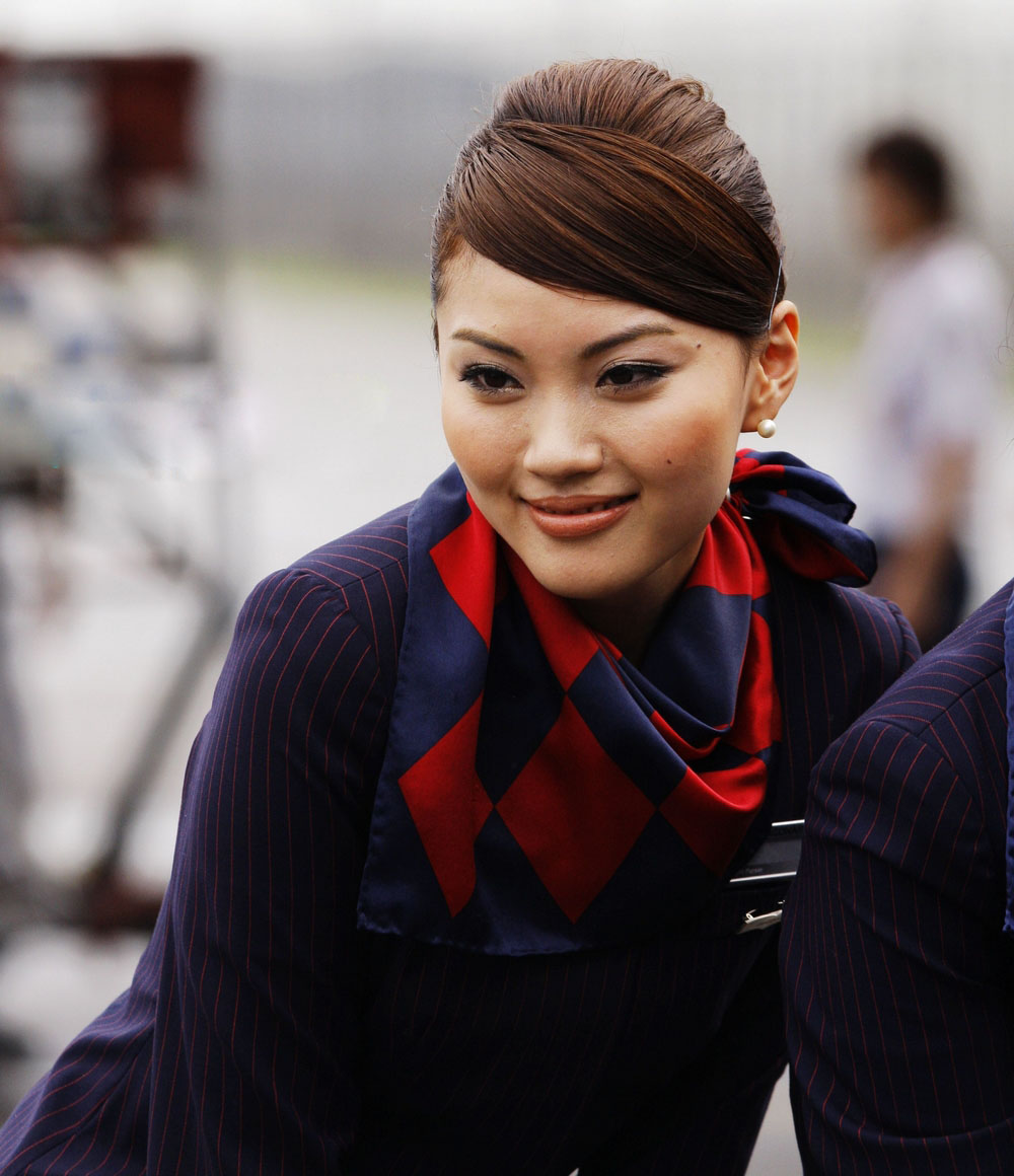 Beautiful Air Hostesses in Dragon Air ~ World stewardess Crews
