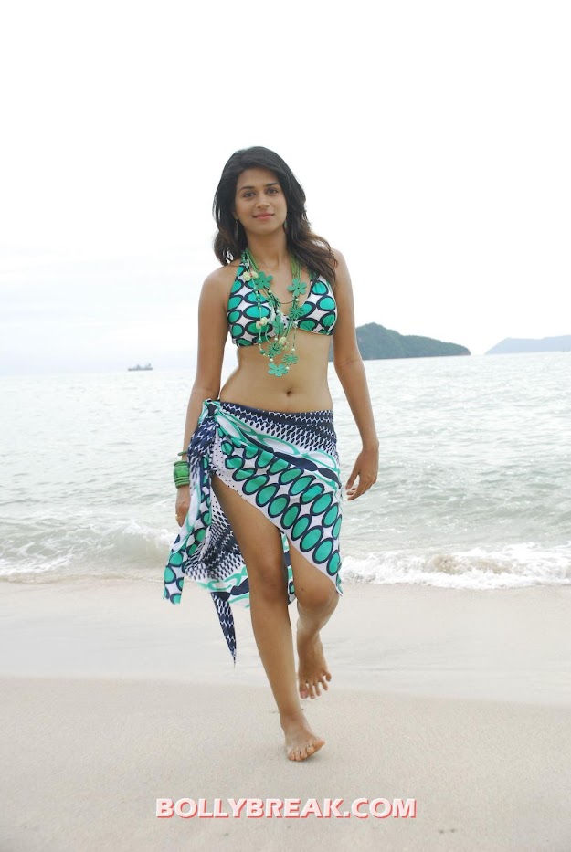 Shradha das looking bang on in a Blue and green printed bikini and cover up -  Shraddha Das in bikini and Hot Beach Pics