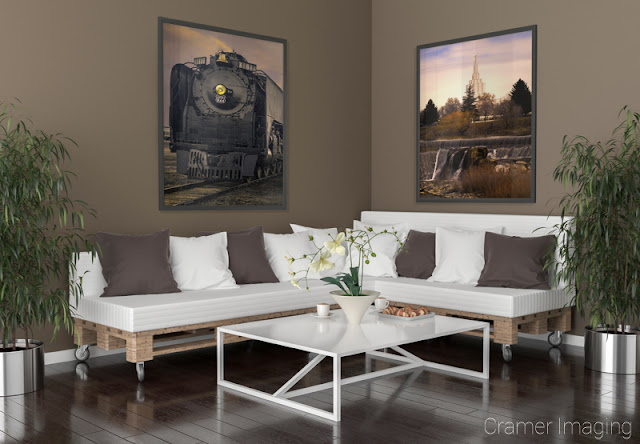Photograph of Cramer Imaging's fine art photographs 'Union Pacific 844 Steam Engine' and 'Idaho Falls Temple' on the wall of a living room setting