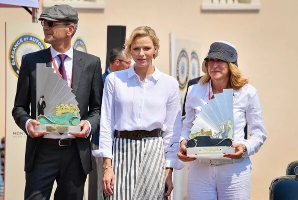 Princess Charlene wore Akris Punto striped flared skirt and white shirt. Prince's Palace of Monaco classical car event