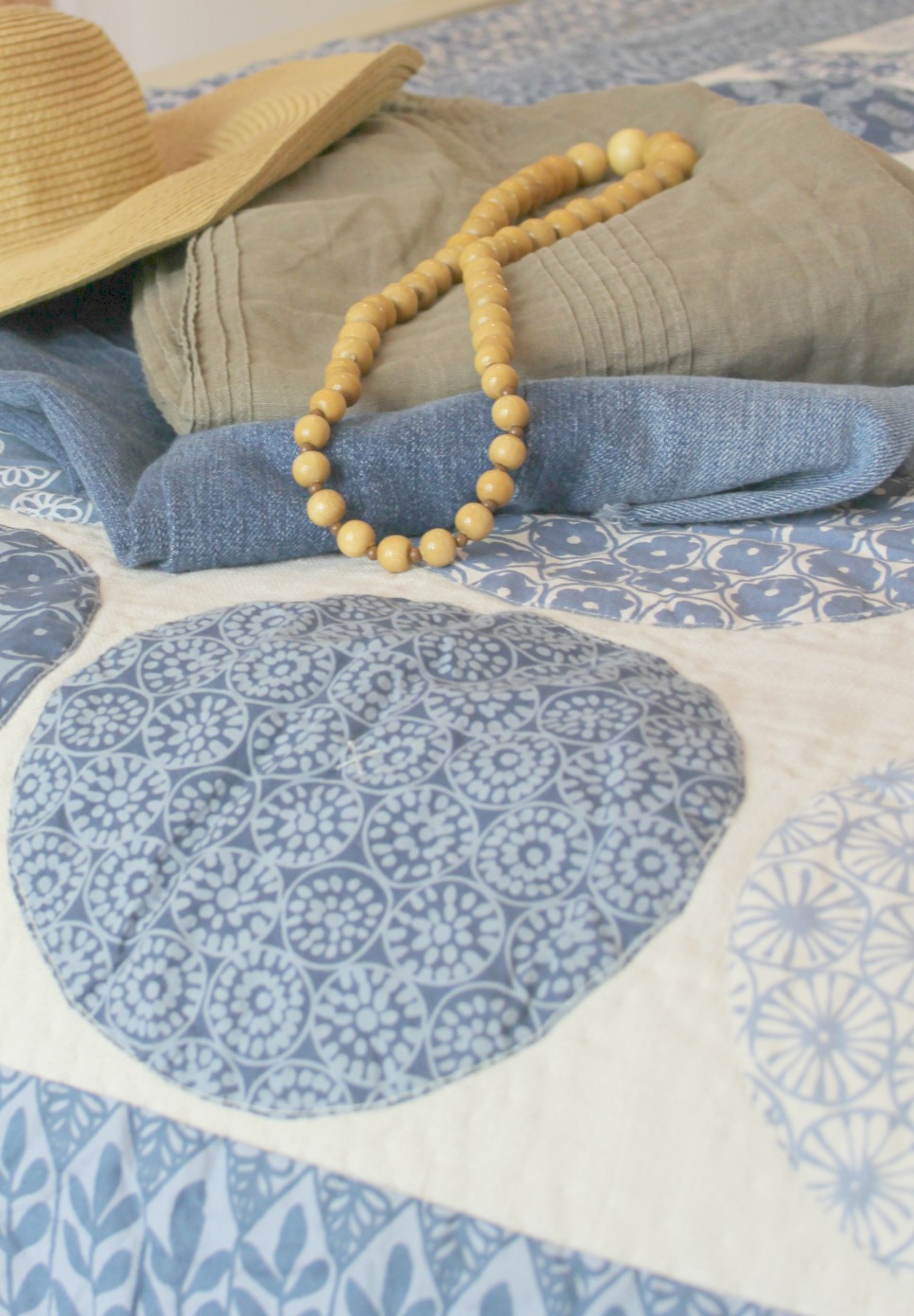 Beautiful blue moon quilt in bedroom with romantic country decor by Hello Lovely Studio