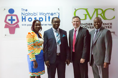 Alberta Wambua, John Kipchumbah, Jim Fruchterman and Dr. Sam Thenya in front of hospital signs