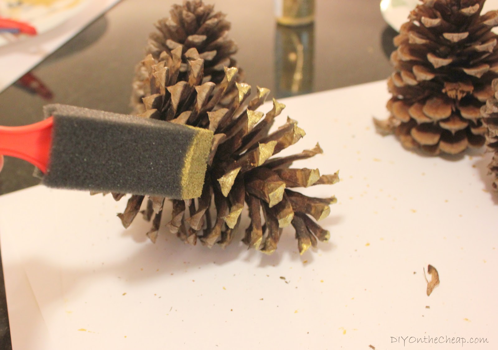 Use pinecones as a vase filler – helps the branches to stay in