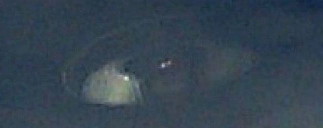 UFO News - Black UFO Hides Over Clouds Caught By NASA Space Station Cam and MORE Cloaked%2Bufo%2Bwindmills%2BIndiana%2B%2B%25282%2529