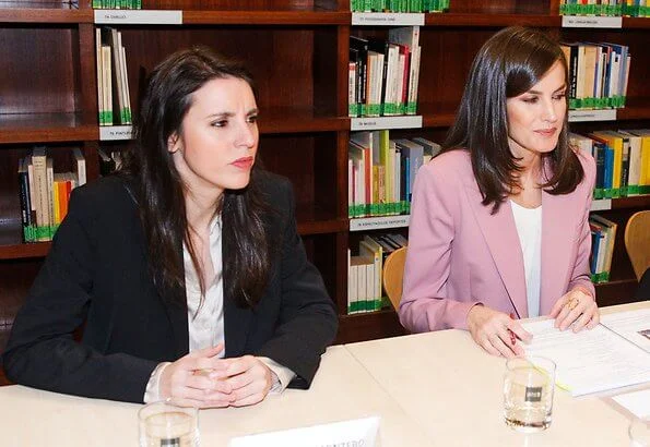 Queen Letizia wore Hugo Boss Jericoa stretch wool double-breasted blazer and trousers. Hugo Boss silk blouse, gold earrings