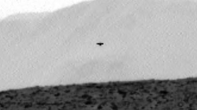 UFO-on-Mars-that-looks-like-a-Bird-or-a-Flying-Saucer-and-some-have-said-it-looks-like-an-Angel-with-wings.