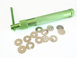 My clay extruder gun with an assortment of shapes to extrude